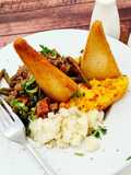 Savoury minced beef and mashed potatoes with creamed carrots and swede