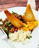 Savoury minced beef and mashed potatoes with creamed carrots and swede