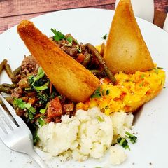 A picture of Savoury minced beef and mashed potatoes with creamed carrots and swede.