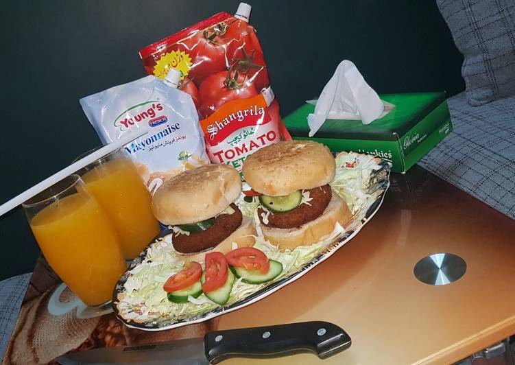 Reshmi kabab burger with orange juice