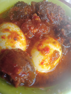 A picture of Designer stew (ayamase/ ofada stew).