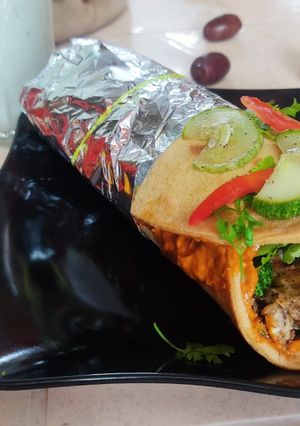 A picture of Jain Paneer Tikka Masala Shawarma.