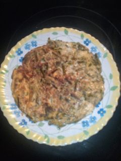 Una foto de Tortilla de espárragos con cebolla y taquitos de jamón