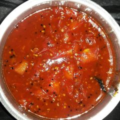 A picture of Tamatar ki khatti meethi chutney.