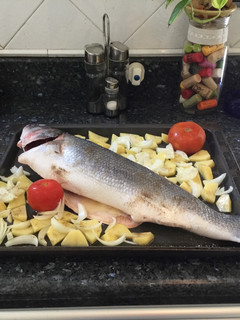 Una foto de Lubina al horno