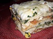 Una foto de lasagna acelga y choclo