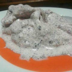 A picture of Strawberry Ice cream with Oreo.