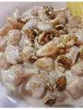 Gnocchi di zucca con crema di formaggi e noci