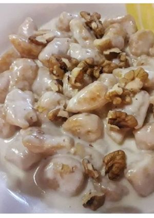 Foto di Gnocchi di zucca con crema di formaggi e noci