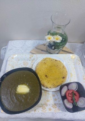 A picture of Sarson ka Saag with makai roti.