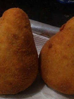 Una foto de Coixinhas de pollo