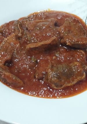 Una foto de Lengua con tomate