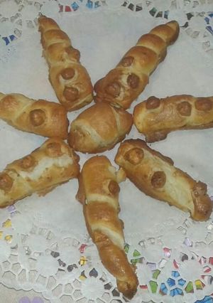 Una foto de Hojaldres preñados de chocolate y glasé con avellanas