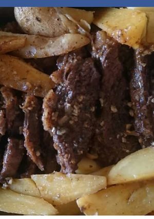 Una foto de Carne al horno con papas 😁
