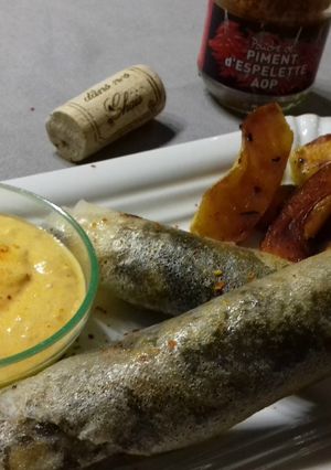 Une photo de Cigares de boudin aux oignons confits, sauce crémeuse au piment d'Espelette