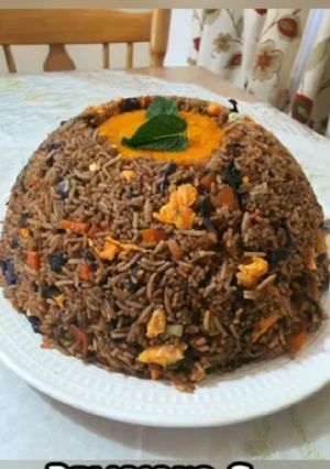A picture of Volcano rice with pepper sauce.