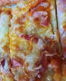 Pizza cuixot salat,amb beicon, ceba i formatge sense lactosa