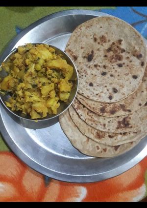 A picture of Aloo Gobi Matar (Potato, Cauliflower, and Pea Curry).