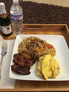 A picture of Pan fried Noodle, Eggs and Plantain.