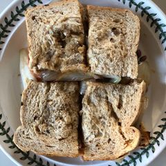 A picture of Chunky Bacon, Shallot, Garlic & Tomato Butty.