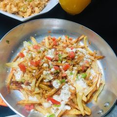 A picture of Cheesy fries.