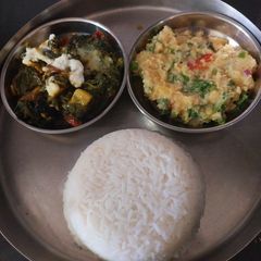 A picture of Xaak and Aloo Pitika.