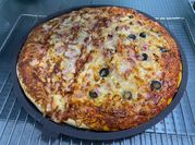 Una foto de pizza con polenta