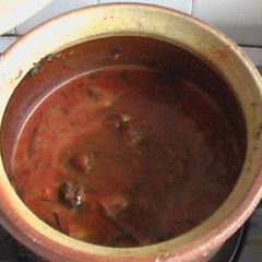A picture of Kerala Style Claypot Red Fish Curry.