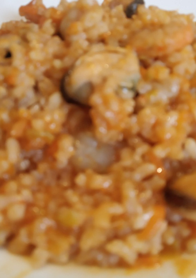 Una foto de Arroz seco o caldoso con gambas y mejillones