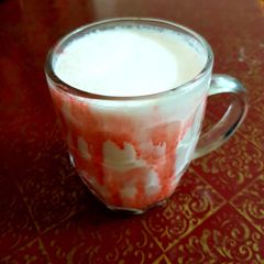 A picture of Lassi with jam-e-shirin.