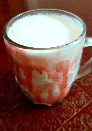 A picture of Lassi with jam-e-shirin.