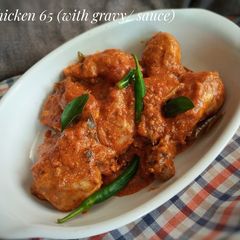 A picture of Chicken 65 with sauce/Gravy.