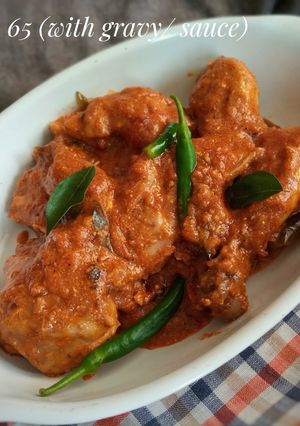 A picture of Chicken 65 with sauce/Gravy.