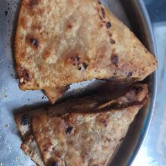 A picture of Samosa style sayal fulka.