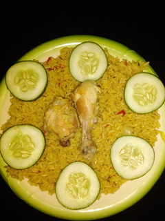 A picture of Simple jollof rice with chicken.