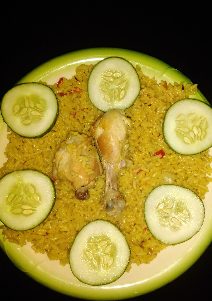 A picture of Simple jollof rice with chicken.