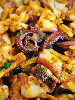 Una foto de Pulpo a la Gallega con Papada ibérica