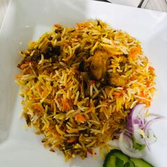 A picture of Chicken malai tikka biryani.