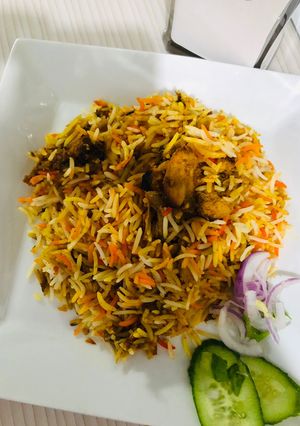A picture of Chicken malai tikka biryani.