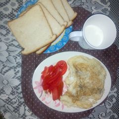 A picture of Black pepper eggs,sliced tomatoes.