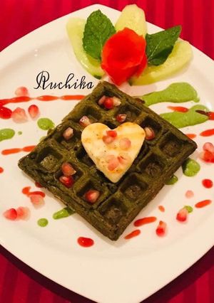 A picture of Daal Palak waffles with grilled Paneer.