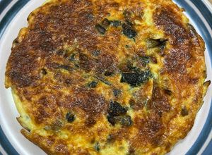 Une photo de Quiche sans pâte garniture épinards, champignons, lardons, oignons