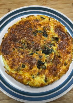 Une photo de Quiche sans pâte garniture épinards, champignons, lardons, oignons