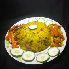 Dambu shinkafa with veg.sauce A picture of Dambu shinkafa with veg.sauce.