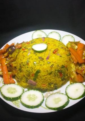 A picture of Dambu shinkafa with veg.sauce.