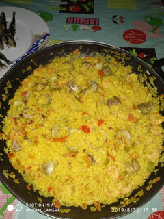 Una foto de Paella