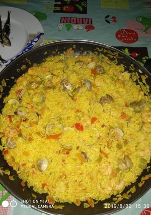 Una foto de Paella