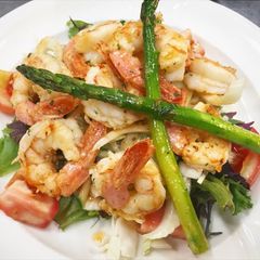 A picture of Pan fried prawns (shrimps) asparagus and fennel salad.
