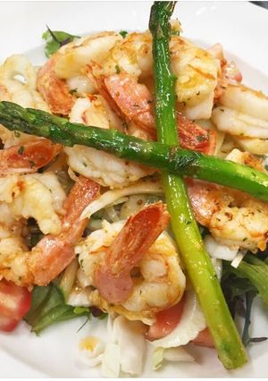 A picture of Pan fried prawns (shrimps) asparagus and fennel salad.