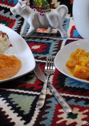A picture of Persian Chicken  stew with dried apricots.
